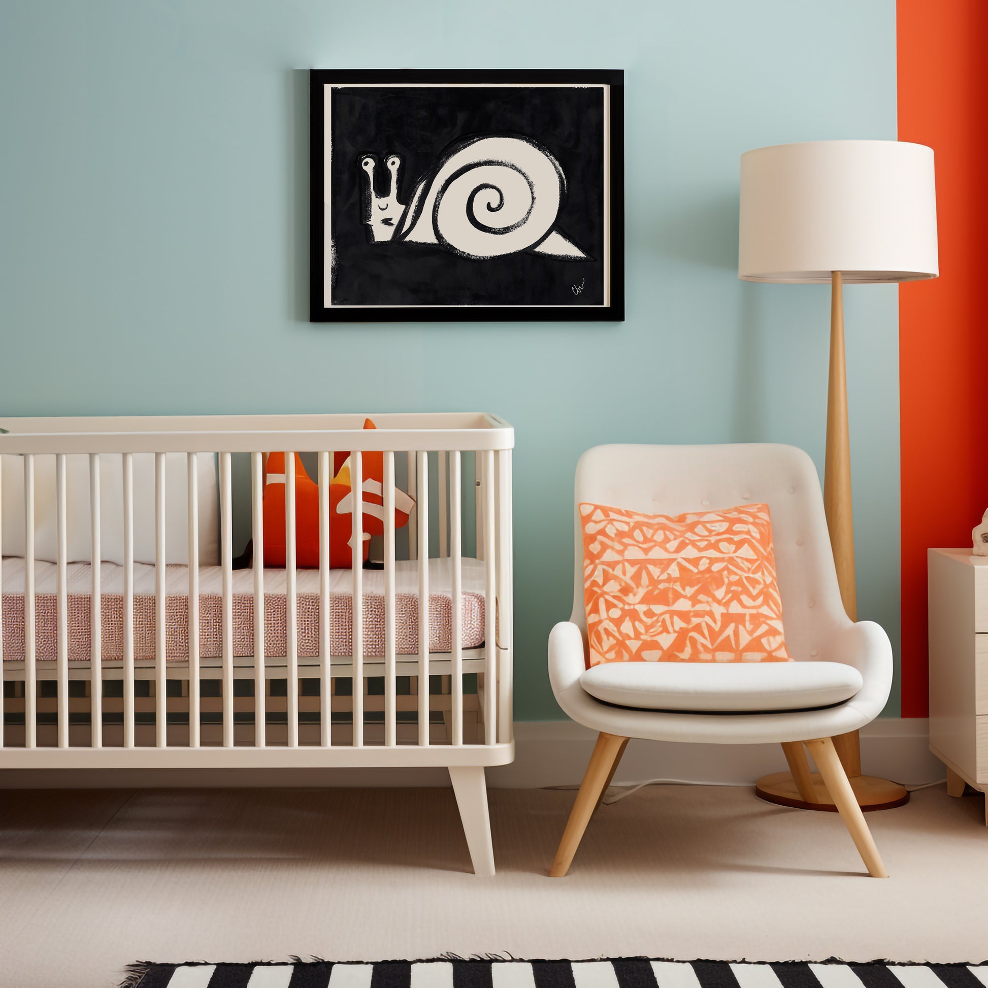 A modern nursery featuring a crib, a comfortable chair with a decorative pillow, and a snail artwork on the wall.