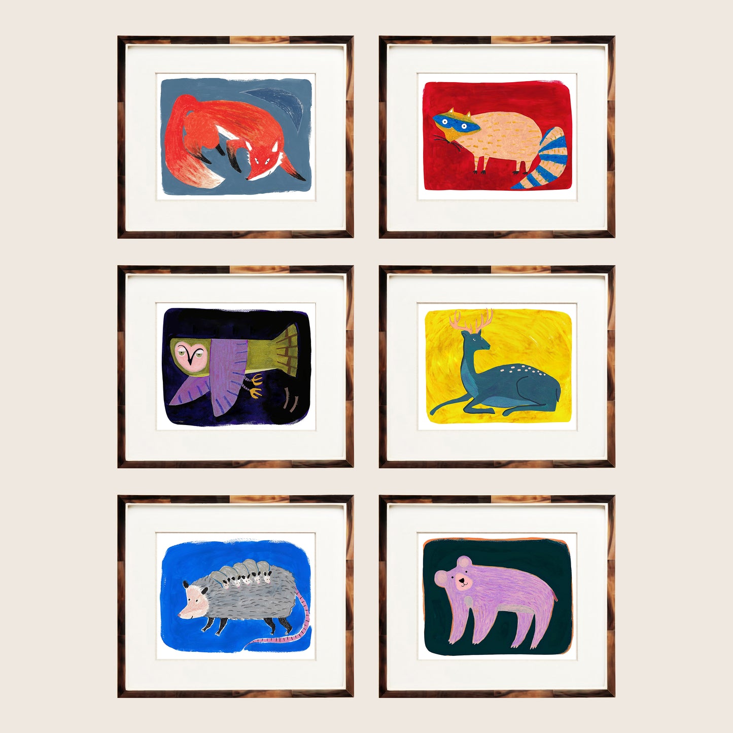 Six framed colorful animal illustrations featuring a fox, raccoon, owl, deer, hedgehog, and a bear.