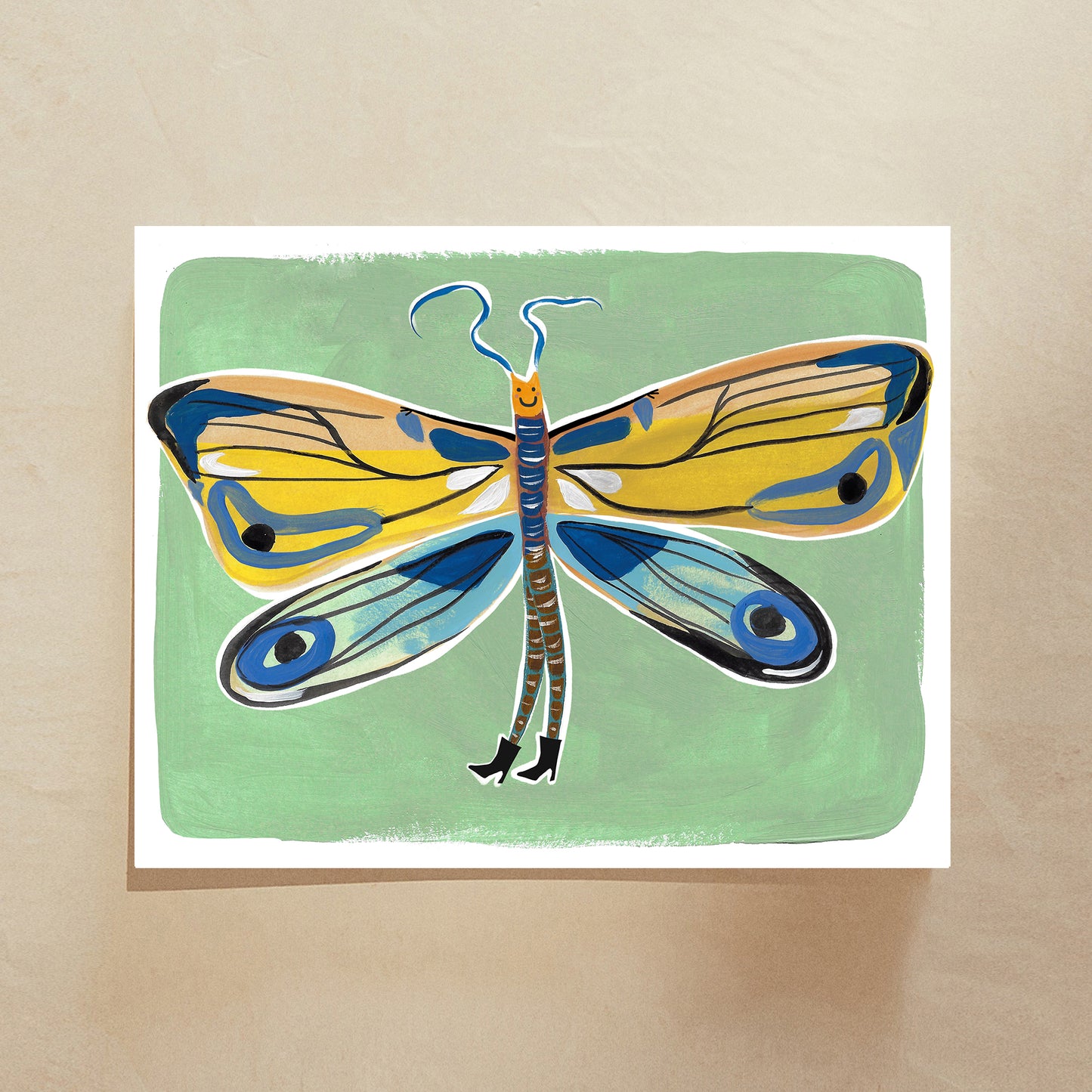 A colorful illustration of a butterfly with blue and yellow wings on a green background.
