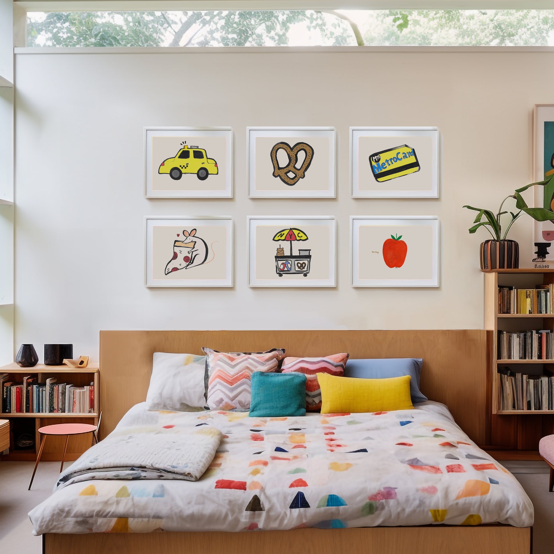 Cozy bedroom with a colorful quilt and framed art on the wall