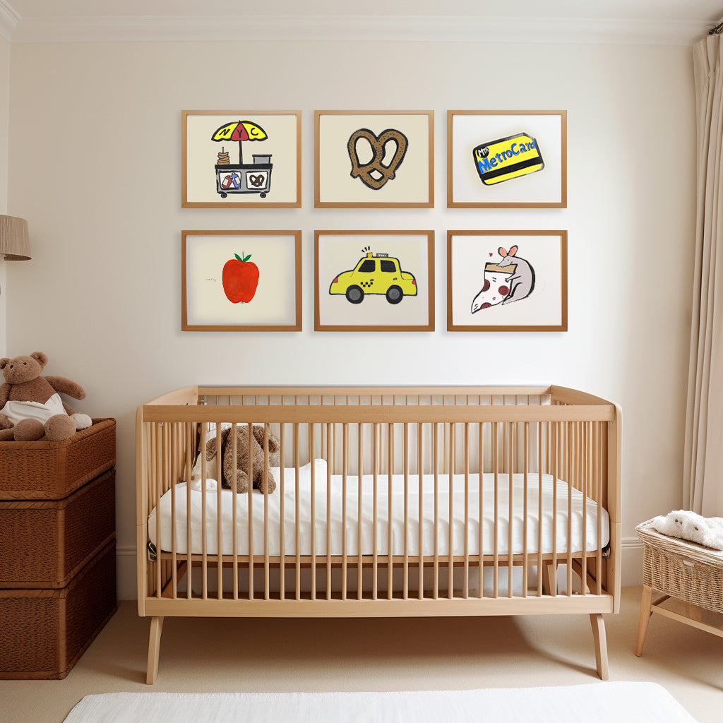 A cozy nursery with a wooden crib, a stuffed animal, and framed illustrations on the wall.