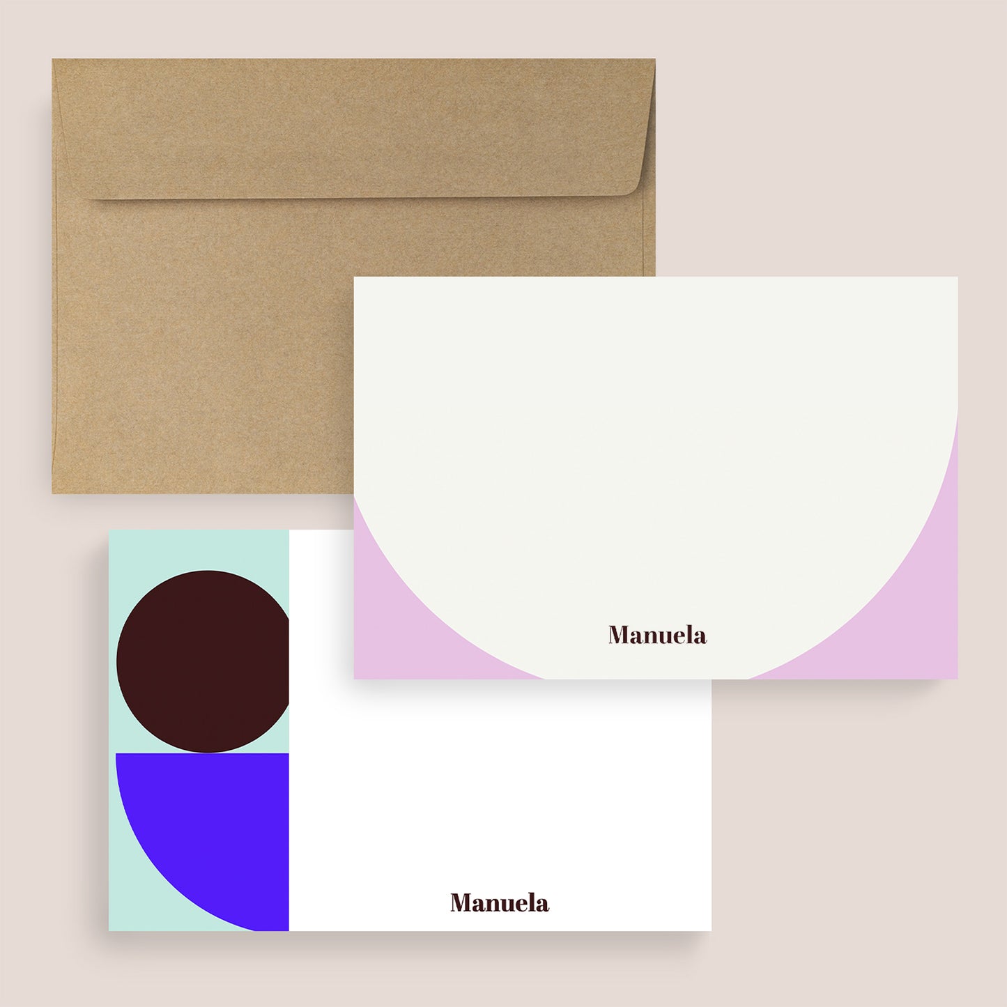 Minimalist greeting cards with geometric designs and a kraft envelope.