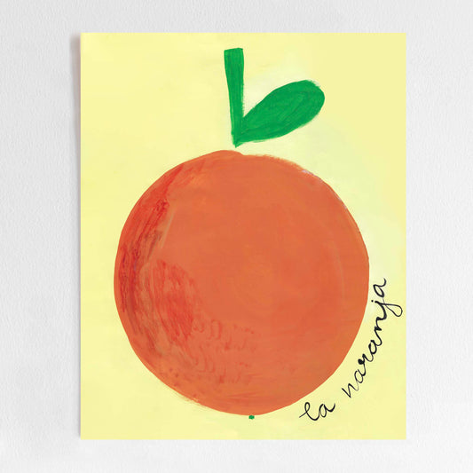 A colorful illustration of an orange with a green leaf on a yellow background, labeled 'la naranja'.