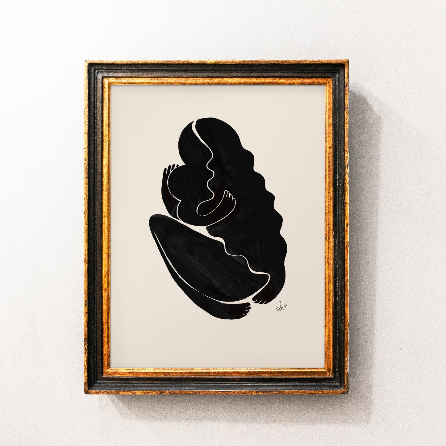 Abstract black line art of a seated figure in a gold-framed picture