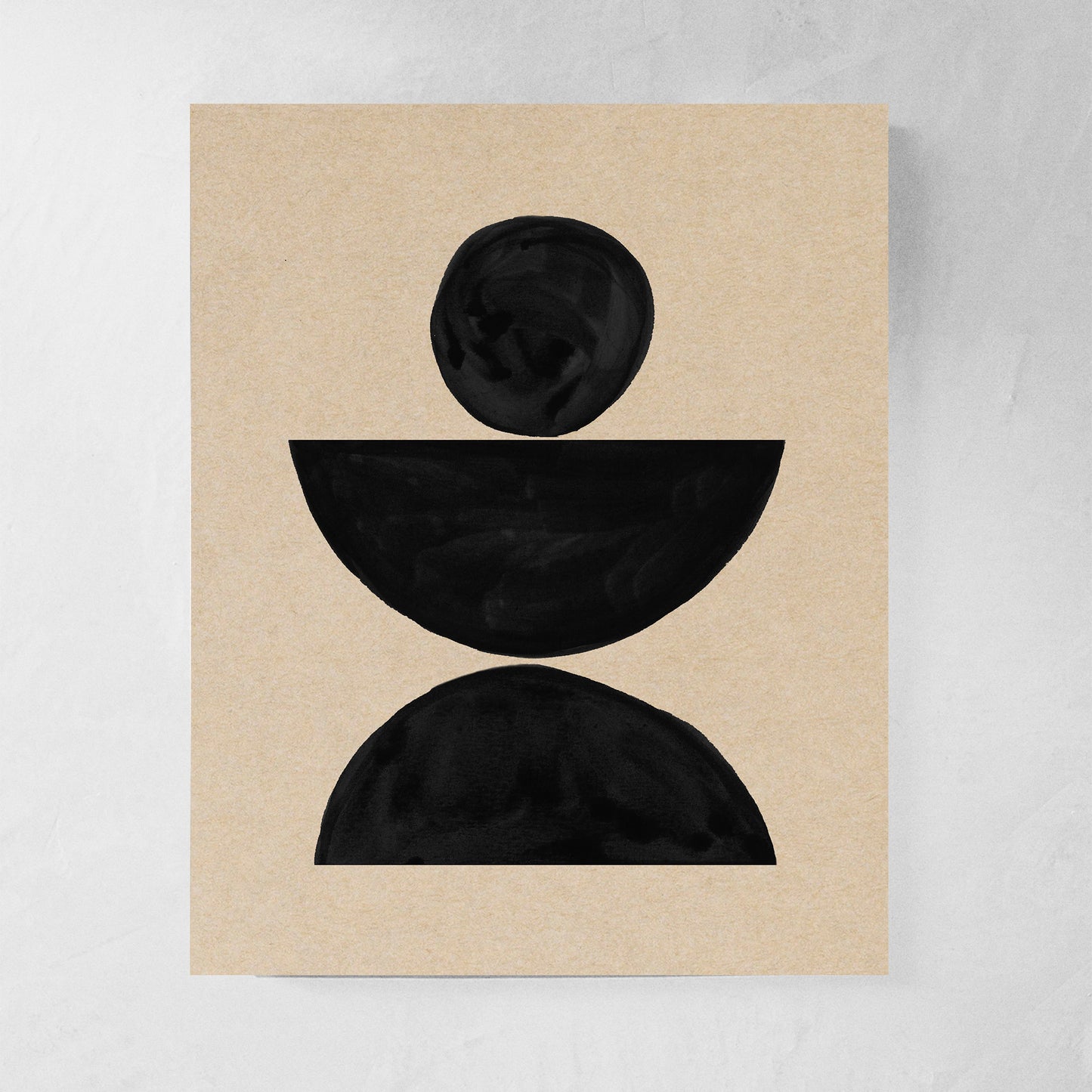 Abstract black and beige shapes arrangement on textured background.